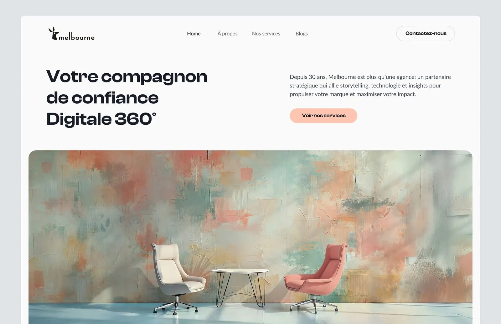 Two modern swivel chairs, one beige and one pink, facing each other with a round white table between them, set against a colorful abstract wall.