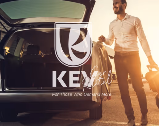 Man carrying a suitcase and jacket walking next to an open car trunk at sunset with a Key Car Rental logo overlay.