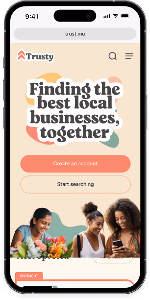Mobile screen showing Trusty website with text 'Finding the best local businesses, together,' buttons for creating an account and starting search, and three smiling women holding flowers and a phone.